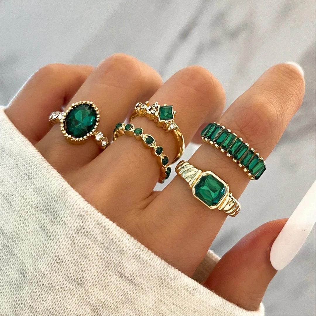 Luxury rings with green zirconias in gold