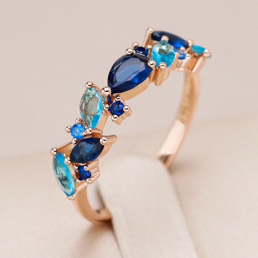 Elegant ring with blue crystals gold plated