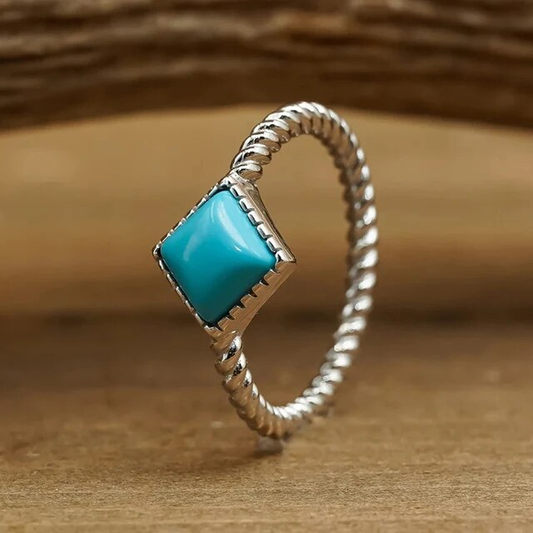 Turquoise braided ring in vintage silver