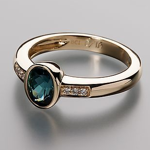 Ring with blue inlaid crystal