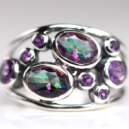 Ring with inlays of colorful crystal in vintage silver