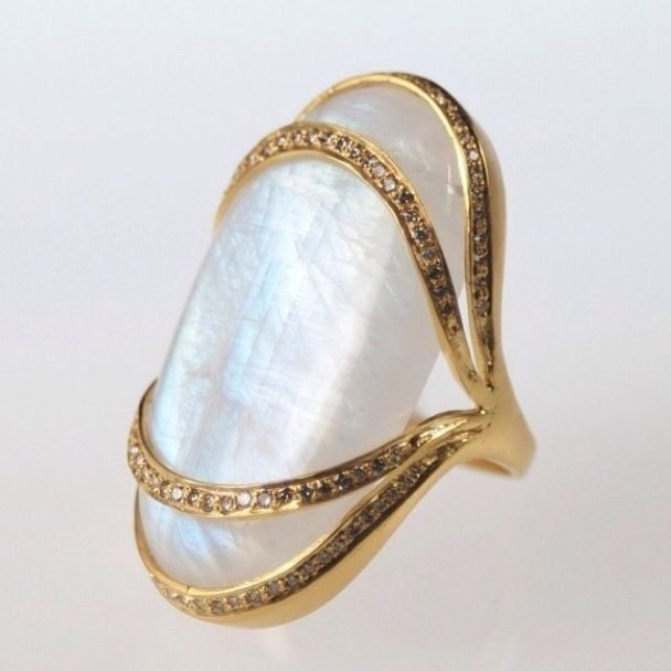 Ring with white stone in vintage gold